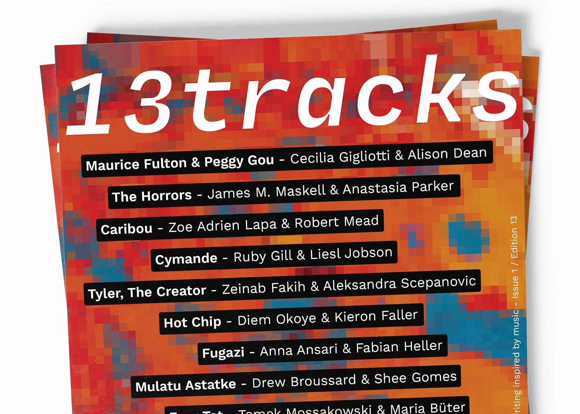 Magazine titled '13tracks' with a colorful cover on a white background